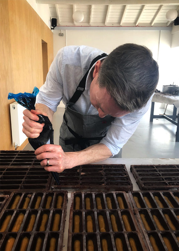 David Crichton filling bars